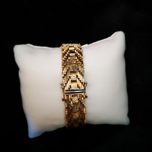 Very intricate two toned gold tone bracelet